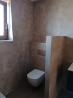 Koupelna s vinylem BUKOMA travertine